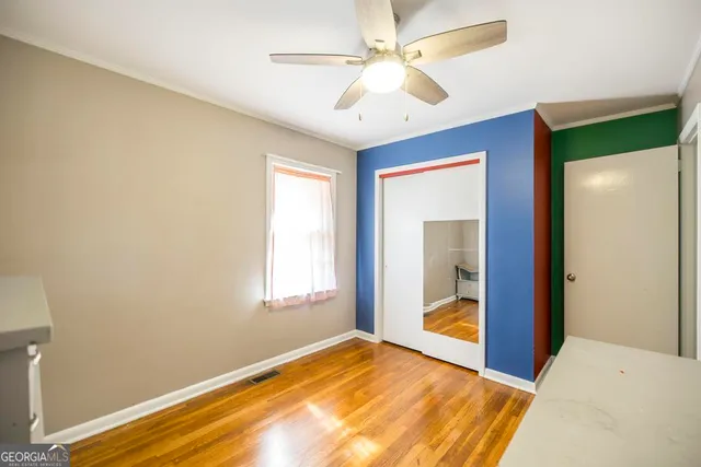 a view of an empty room and window