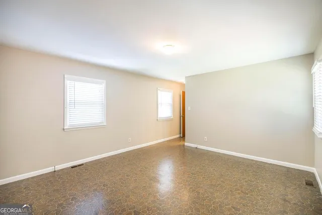a bathroom with a sink vanity and a mirror