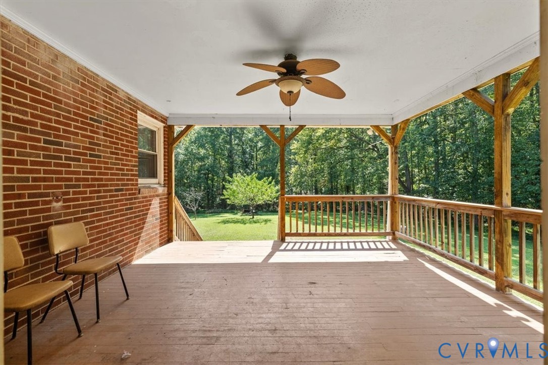3577 Old Buckingham Road Powhatan, VA 23139 - Photo 24 of 36 Covered outdoor deck with a wood-finish floor, woo