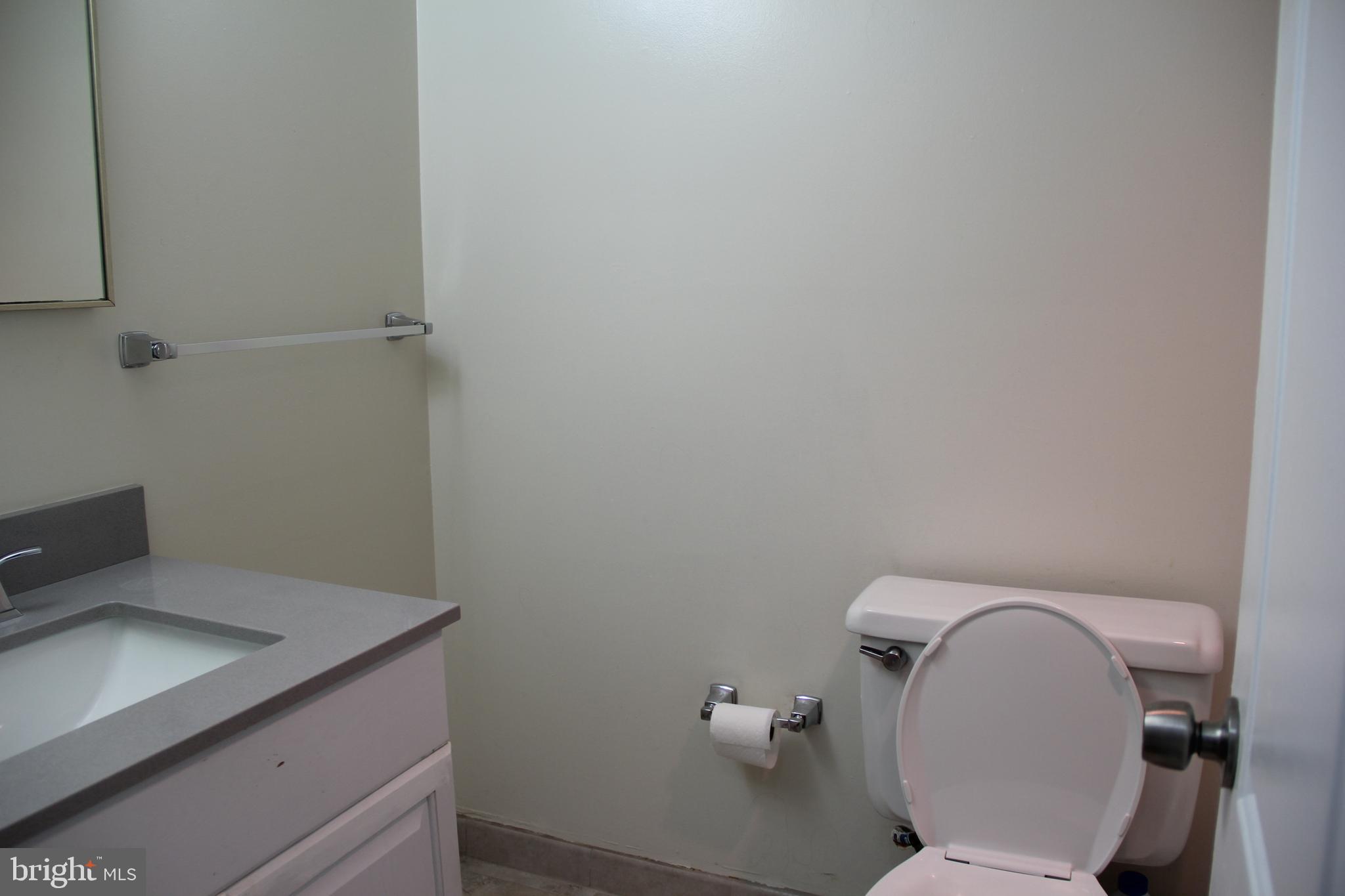 3360 Woodburn Road, Unit 23 Annandale, VA 22003 - Photo 24 of 50 a bathroom with a toilet and sink