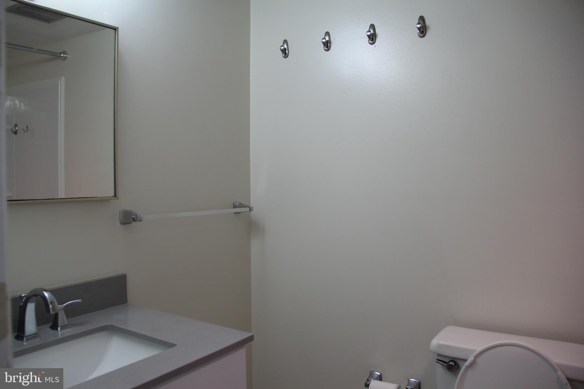 3360 Woodburn Road, Unit 23 Annandale, VA 22003 - Photo 25 of 50 a bathroom with a toilet