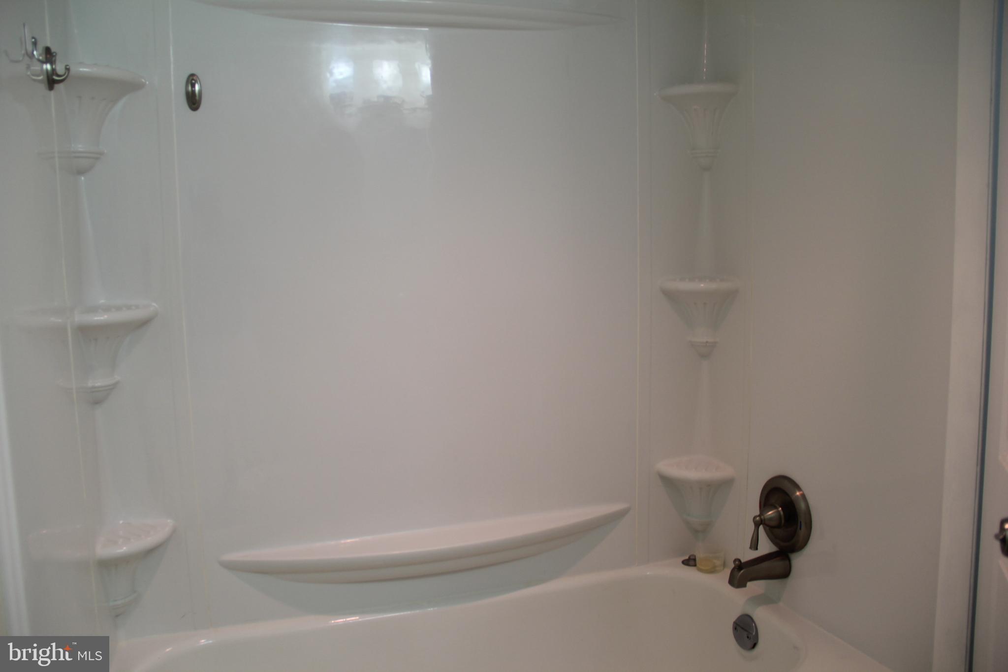 3360 Woodburn Road, Unit 23 Annandale, VA 22003 - Photo 26 of 50 a bathroom with a shower and toilet