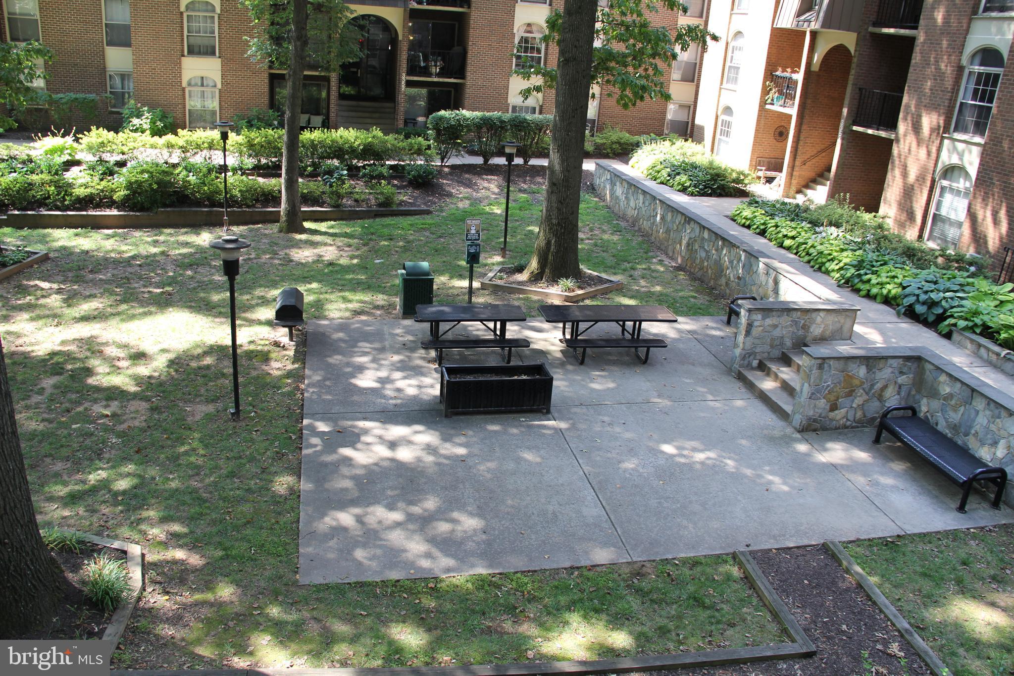 3360 Woodburn Road, Unit 23 Annandale, VA 22003 - Photo 35 of 50 a view of a lake with a patio