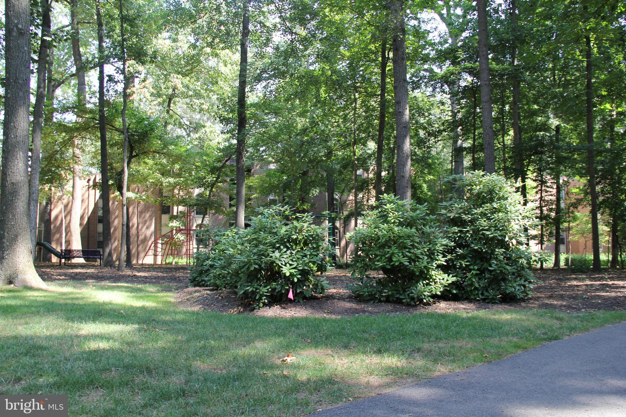 3360 Woodburn Road, Unit 23 Annandale, VA 22003 - Photo 43 of 50 a view of outdoor space with deck and yard