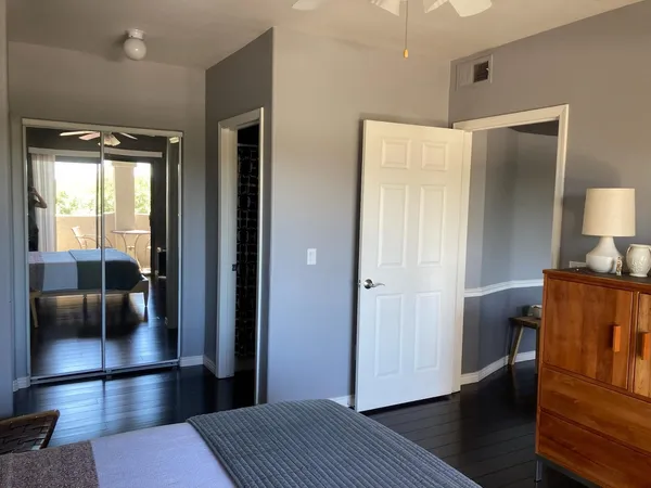 a view of a livingroom with furniture and wooden floor