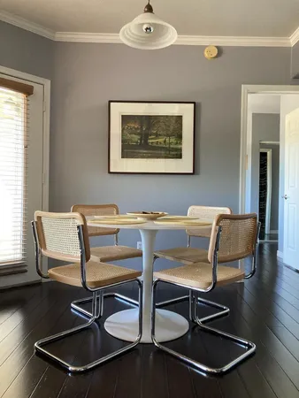 a view of a dining room with furniture