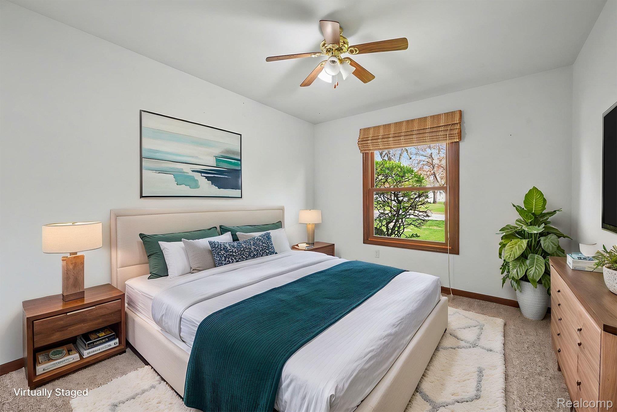 33593 Curtis Road Livonia, MI 48152 - Photo 19 of 30 Bedroom featuring light carpet and ceiling fan