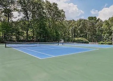 85 Commons Drive, Unit 210 Shrewsbury, MA 01545 - Photo 12 of 15 a tennis court view
