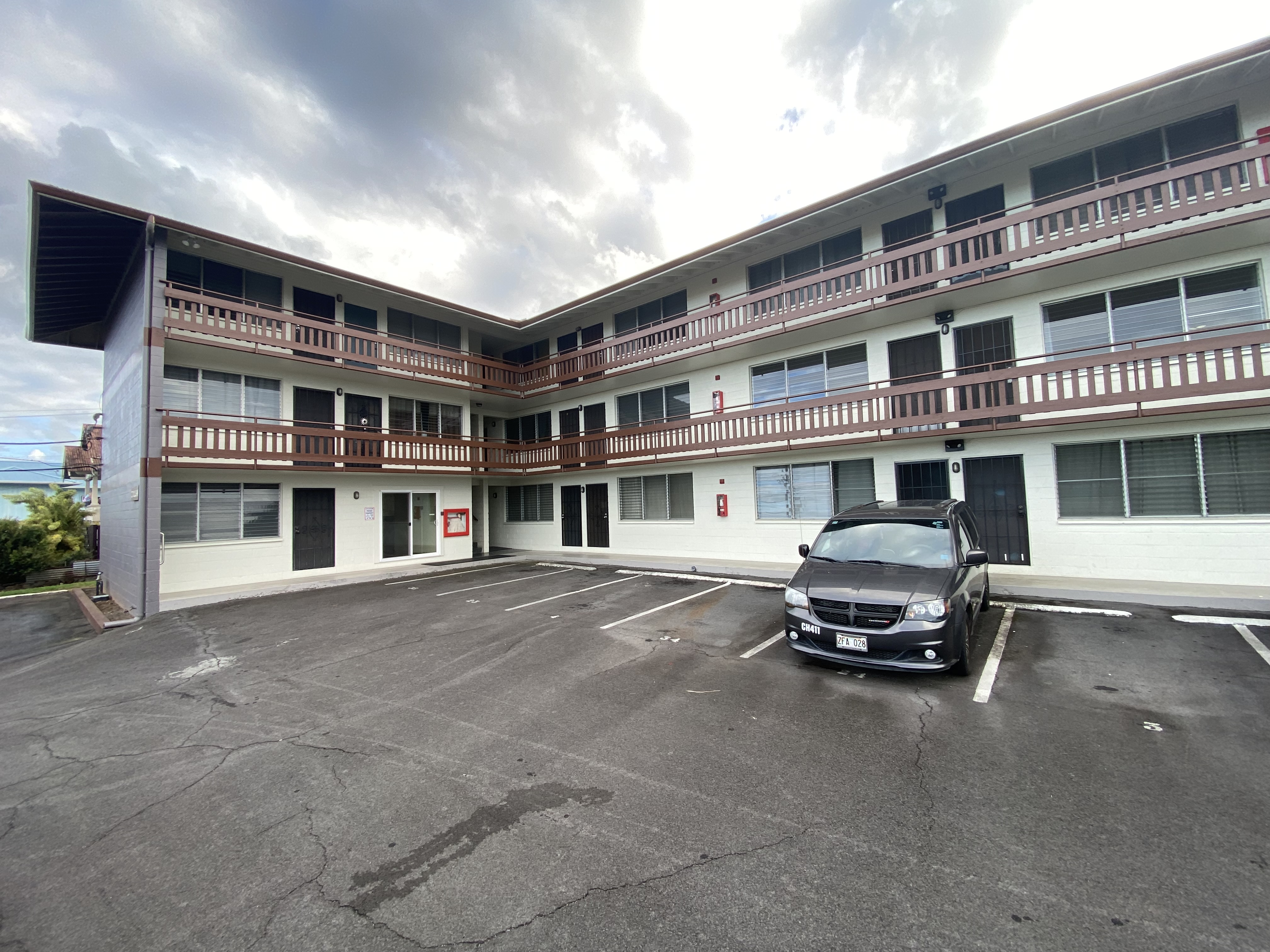 270 Ululani Street, Unit 27 Hilo, HI 96720 - Photo 18 of 19 a car parked in front of building