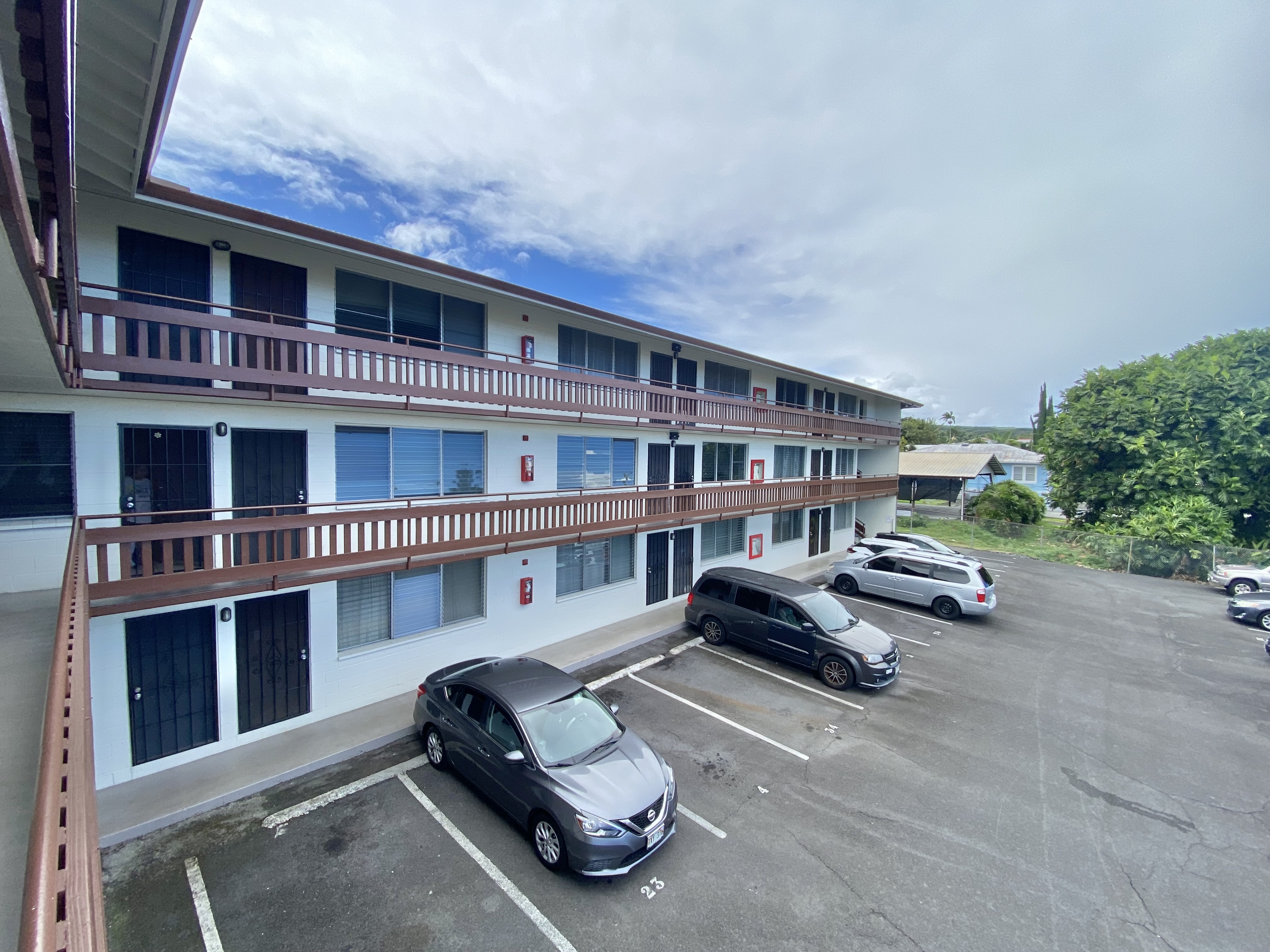 270 Ululani Street, Unit 27 Hilo, HI 96720 - Photo 3 of 19 a car parked in front of a building