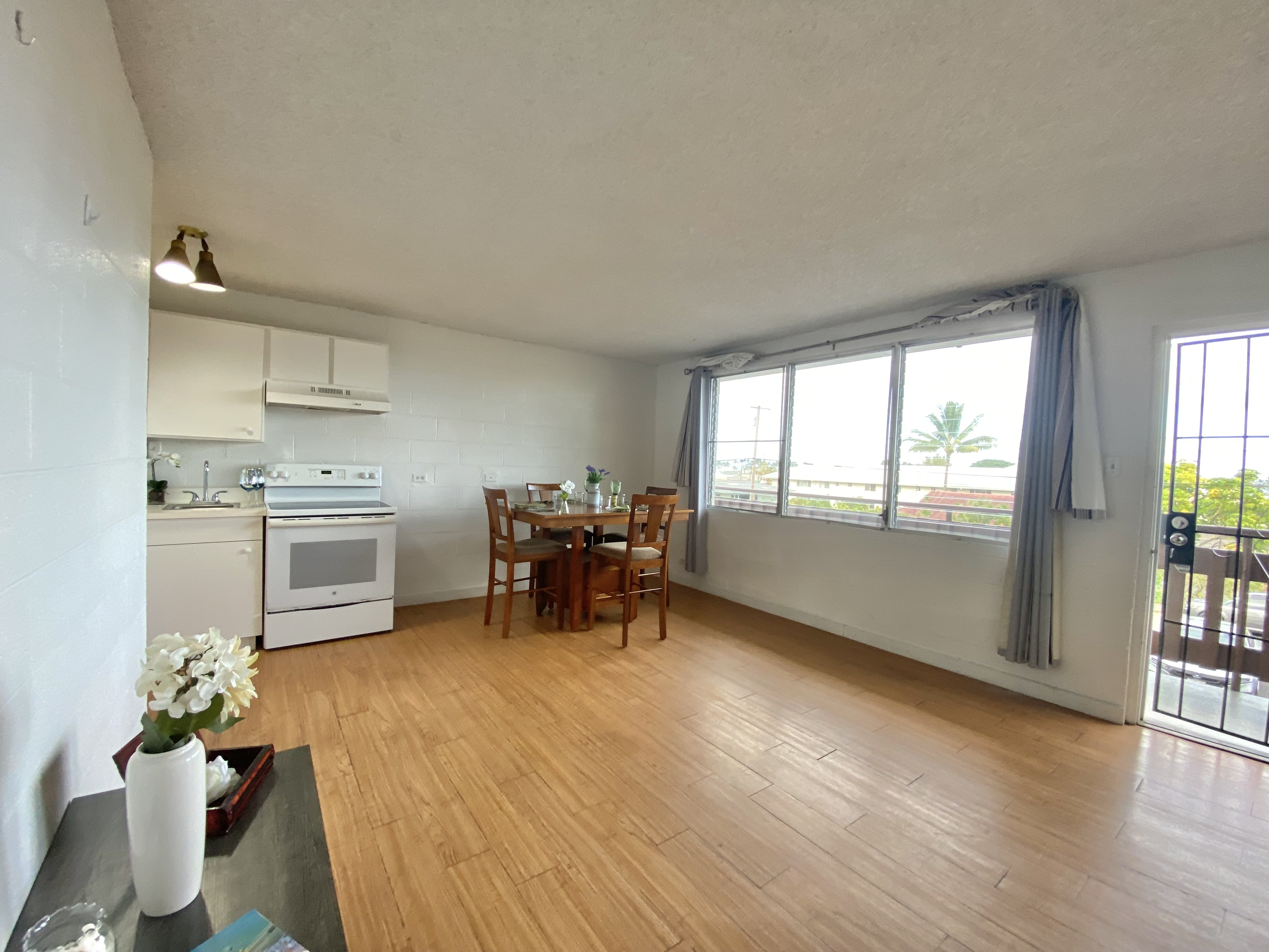 270 Ululani Street, Unit 27 Hilo, HI 96720 - Photo 6 of 19 a view of a kitchen with furniture and a window