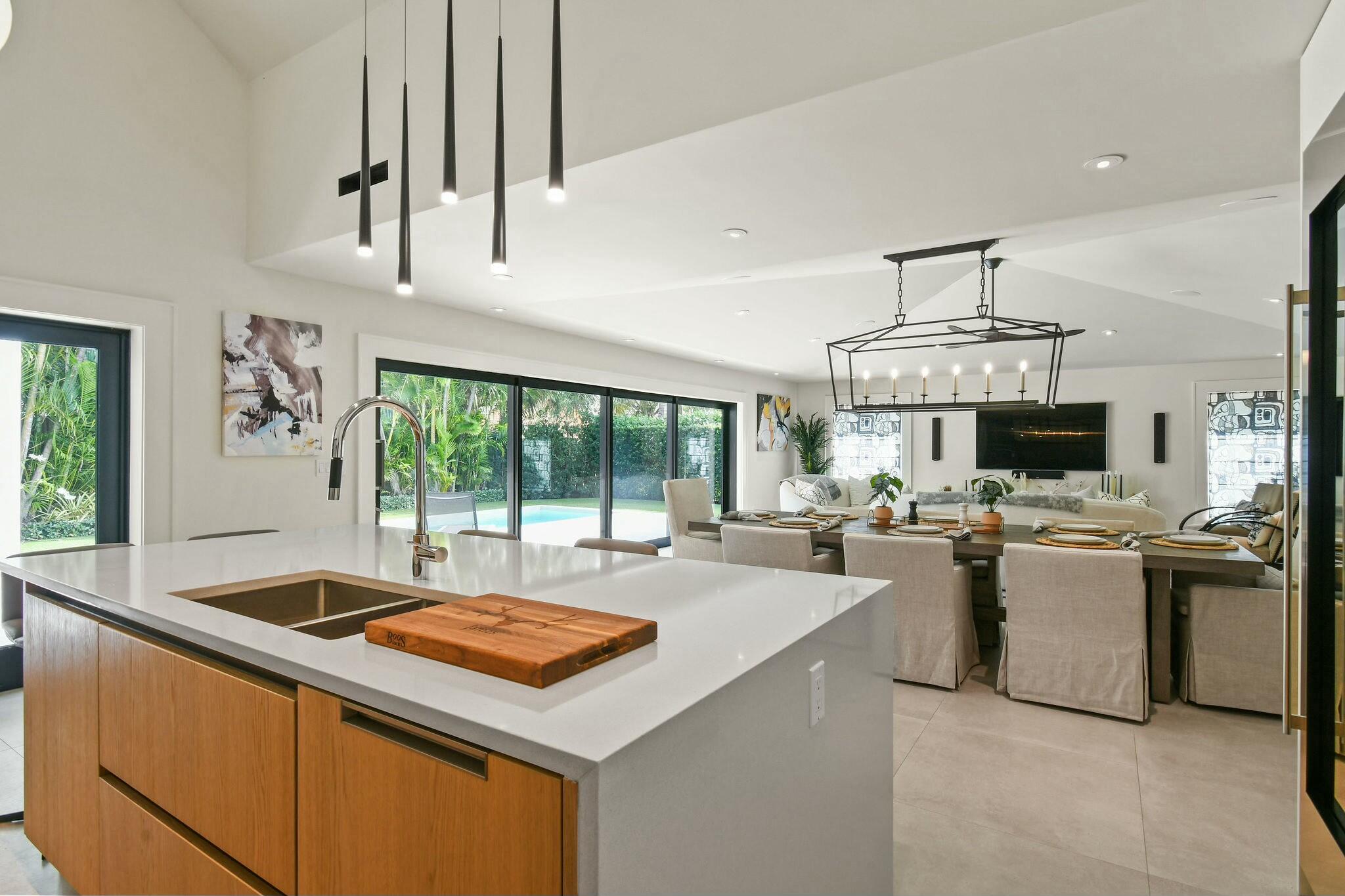 170 Beacon Lane Jupiter Inlet Colony, FL 33469 - Photo 9 of 46 a kitchen with a stove and a view of living room