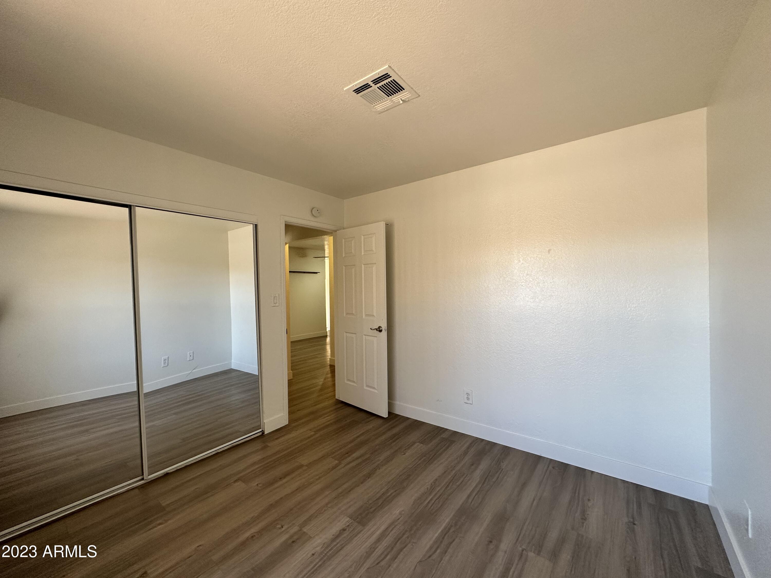 8787 East Mountain View Road, Unit 1103 Scottsdale, AZ 85258 - Photo 9 of 38 a view of an empty room