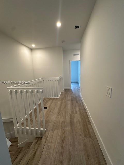 18975 Southwest 345th Terrace, Unit 18975 Homestead, FL 33034 - Photo 11 of 17 a view of a hallway with wooden floor