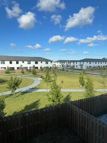 a view of a city with an ocean