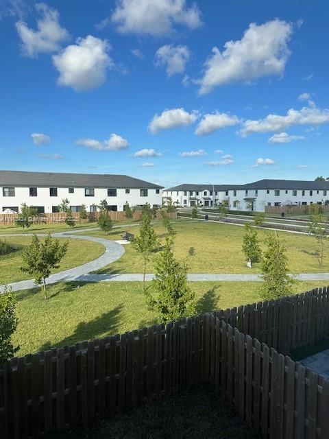 18975 Southwest 345th Terrace, Unit 18975 Homestead, FL 33034 - Photo 3 of 17 a view of a city with an ocean