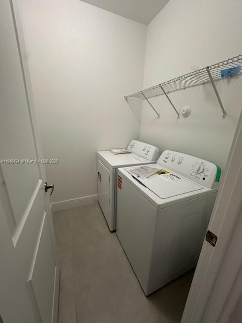 18975 Southwest 345th Terrace, Unit 18975 Homestead, FL 33034 - Photo 9 of 17 a utility room with dryer and washer