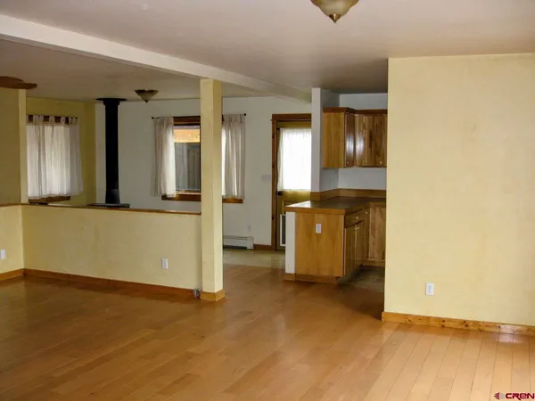 wooden floor and window in a room