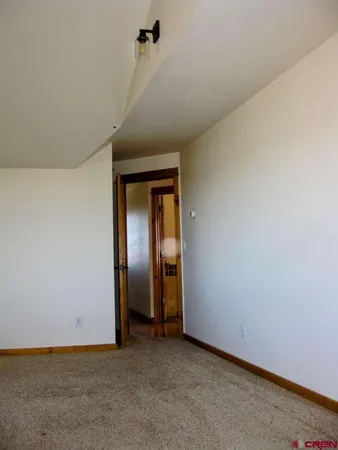 a view of hallway with closet