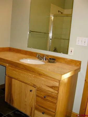 a bathroom with a toilet and a sink