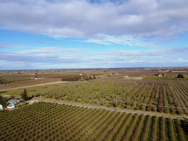 an aerial view of beach and city