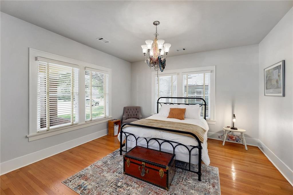1604 South Main Street Georgetown, TX 78626 - Photo 9 of 25 a bedroom with furniture and a window