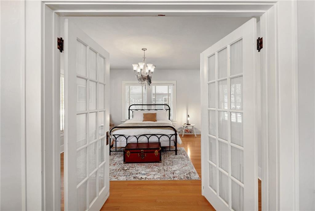 1604 South Main Street Georgetown, TX 78626 - Photo 10 of 25 a view of a hallway with a chandelier