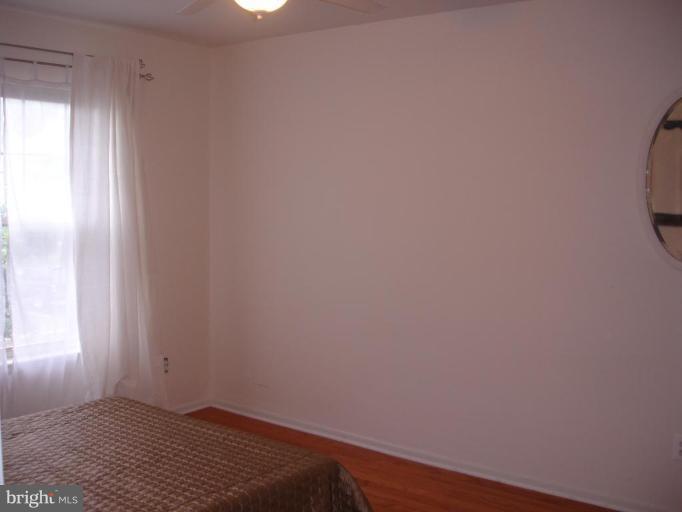 11655 Gas Light Court, Unit 11655C Reston, VA 20190 - Photo 7 of 9 a room with a window
