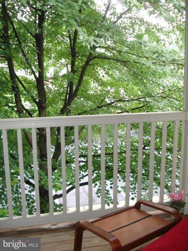 11655 Gas Light Court, Unit 11655C Reston, VA 20190 - Photo 9 of 9 a view of a balcony with lake view