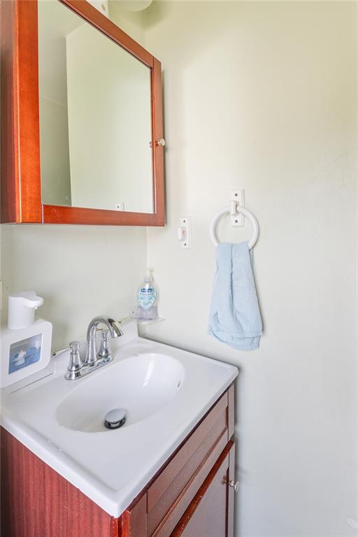 2913 Willett Road Pittsburgh, PA 15227 - Photo 19 of 25 a bathroom with a sink and a mirror