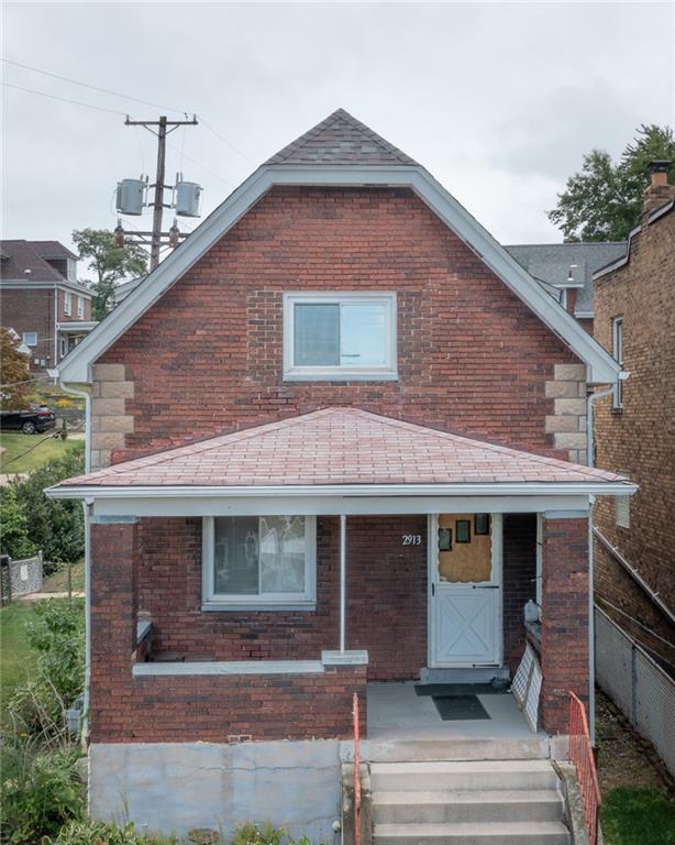 2913 Willett Road Pittsburgh, PA 15227 - Photo 2 of 25 a front view of a house with garage