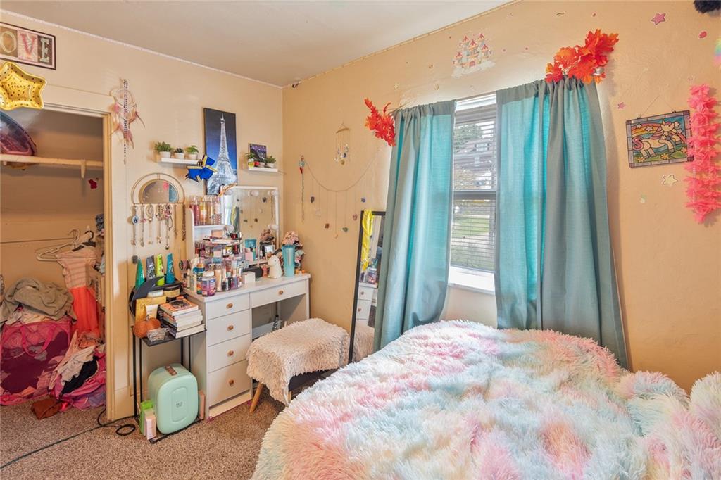 2913 Willett Road Pittsburgh, PA 15227 - Photo 21 of 25 a bedroom with bed and a large mirror