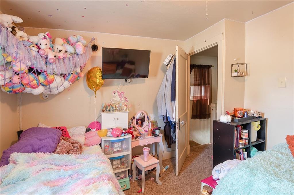 2913 Willett Road Pittsburgh, PA 15227 - Photo 22 of 25 a bedroom with a bed and furniture