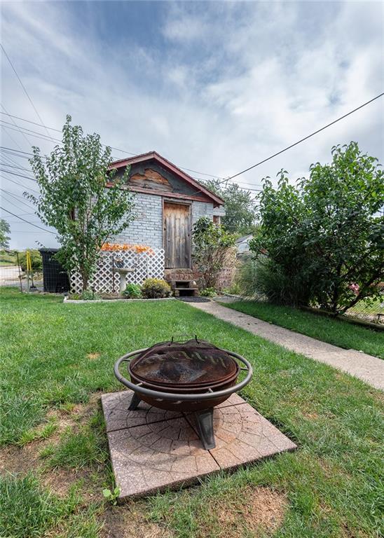2913 Willett Road Pittsburgh, PA 15227 - Photo 5 of 25 a view of a backyard with plants and a garden