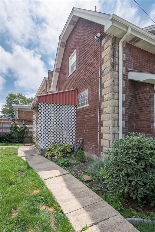 2913 Willett Road Pittsburgh, PA 15227 - Photo 6 of 25 a front view of a house with garden