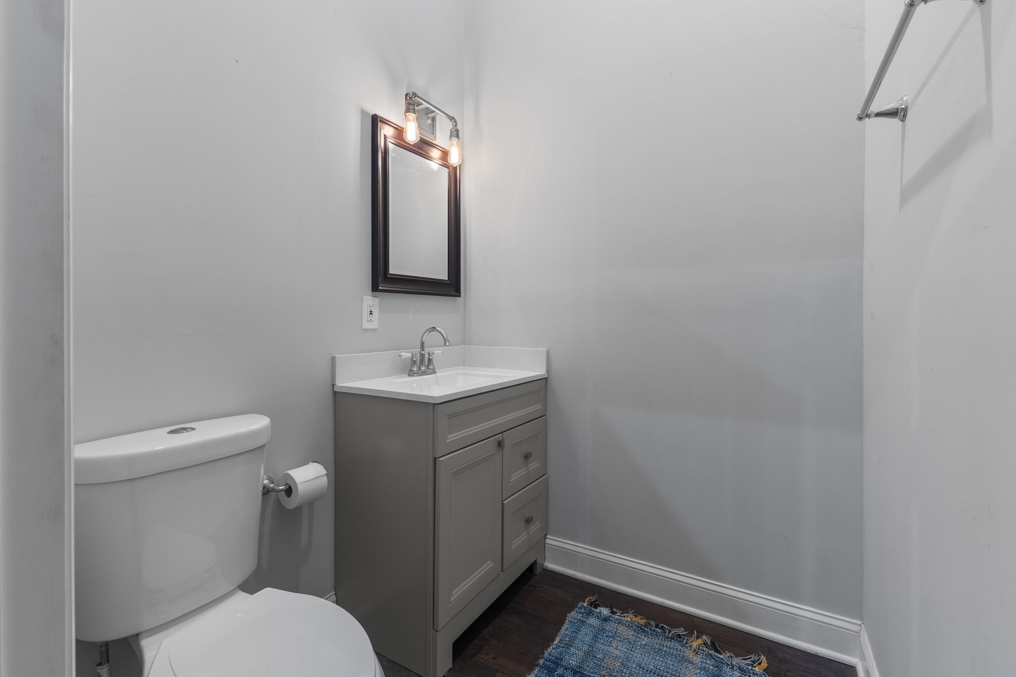 10209 New Hope Road Bon Aqua, TN 37025 - Photo 7 of 22 a bathroom with a toilet sink and mirror