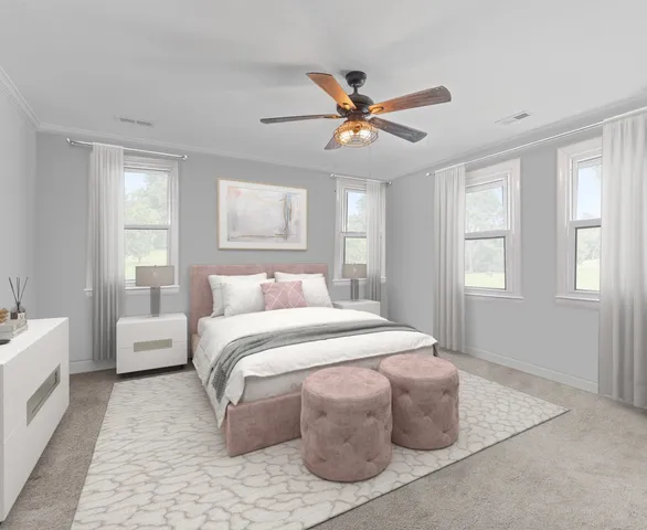 a spacious bedroom with a bed couch and window