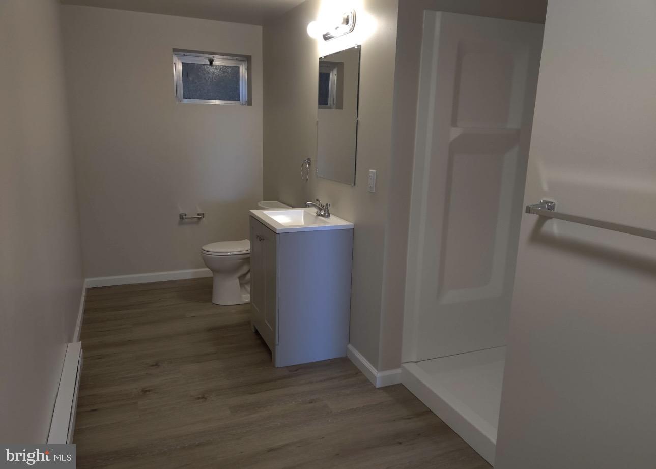 122 East Ridge Road, Unit A2 Marcus Hook, PA 19061 - Photo 5 of 5 a bathroom with a toilet and a shower