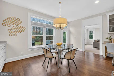 a kitchen with sink and cabinets