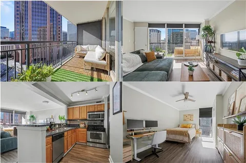 a living room with furniture and kitchen view