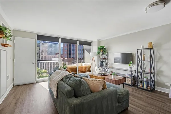 a living room with furniture and a table
