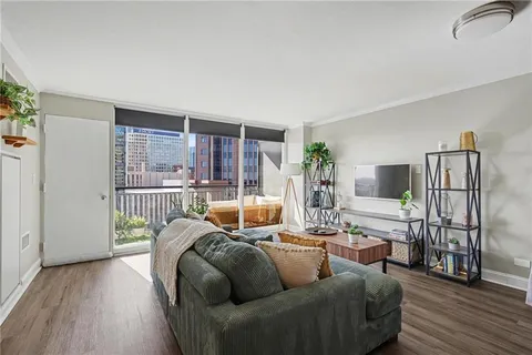 a living room with furniture and a table