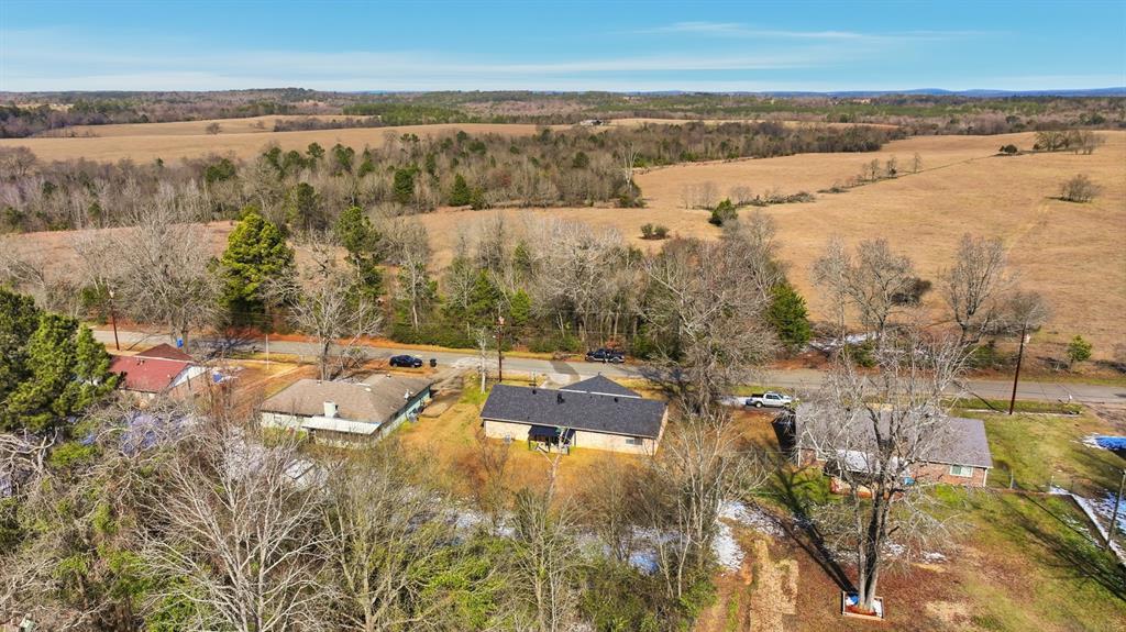 346 Meridian Street Gladewater, TX 75647 - Photo 26 of 28 an aerial view of residential houses with outdoor space