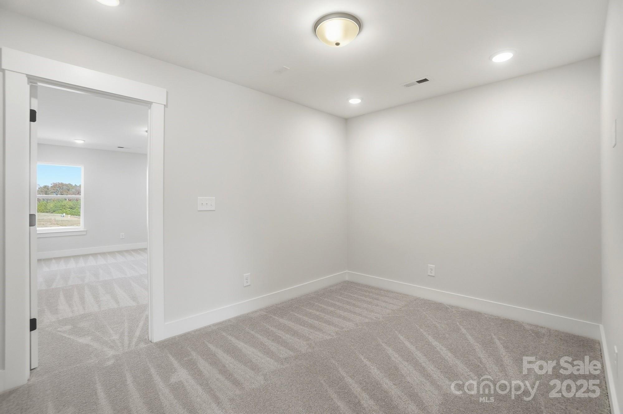 406 Limelight Road Waxhaw, NC 28173 - Photo 25 of 48 wooden floor in an empty room