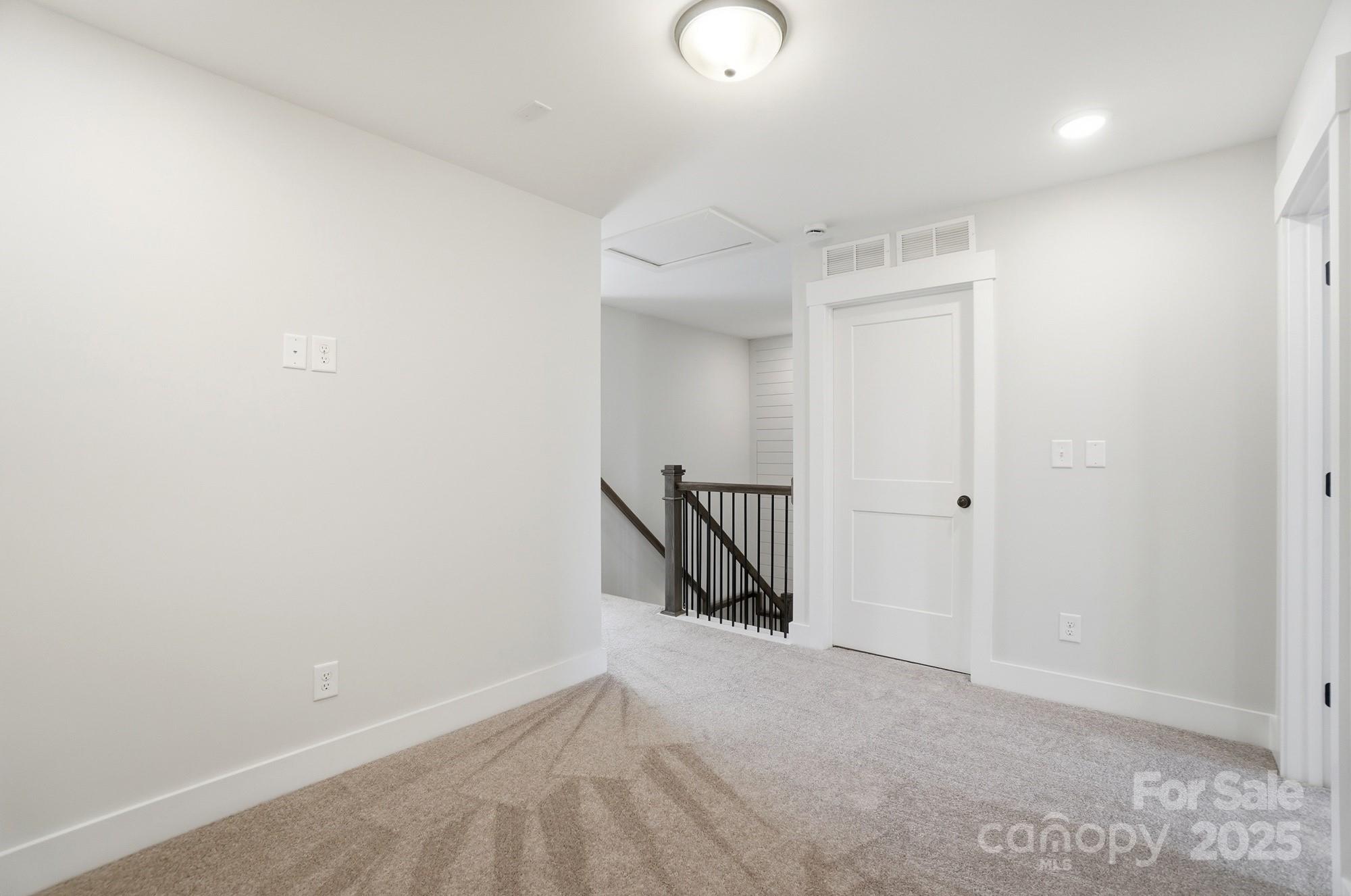 406 Limelight Road Waxhaw, NC 28173 - Photo 28 of 48 a view of a room with an empty space