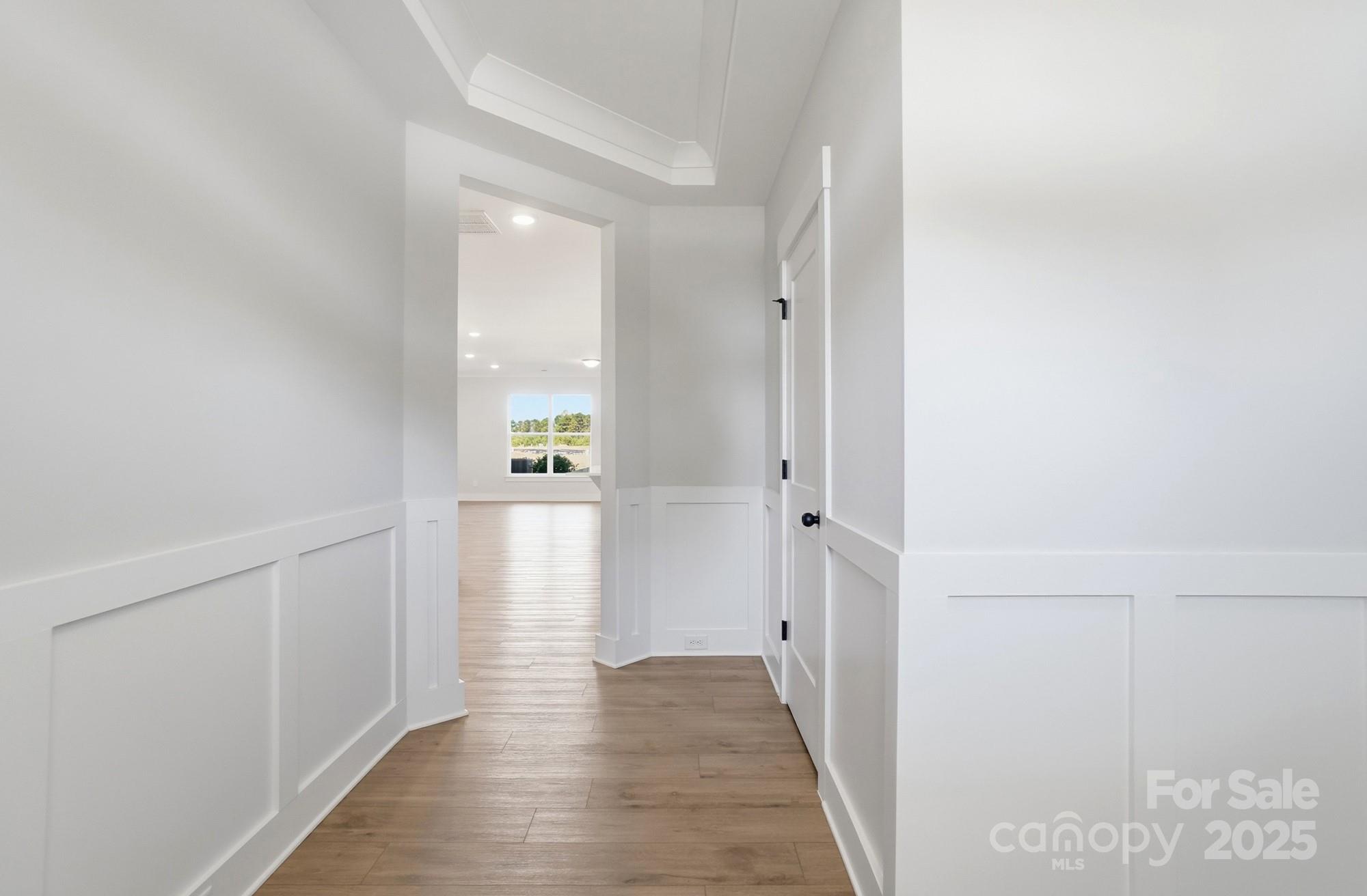 406 Limelight Road Waxhaw, NC 28173 - Photo 7 of 48 a view of a hallway