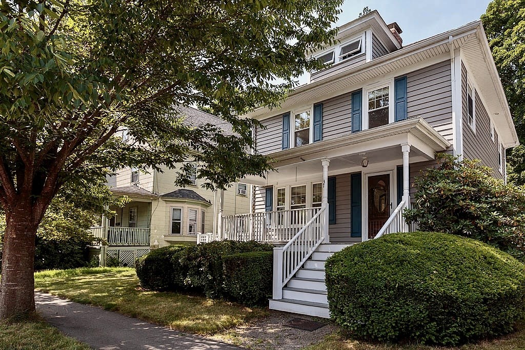 37 Huntington Road Milton, MA 02186 - Photo 1 of 35 a front view of a house with a garden