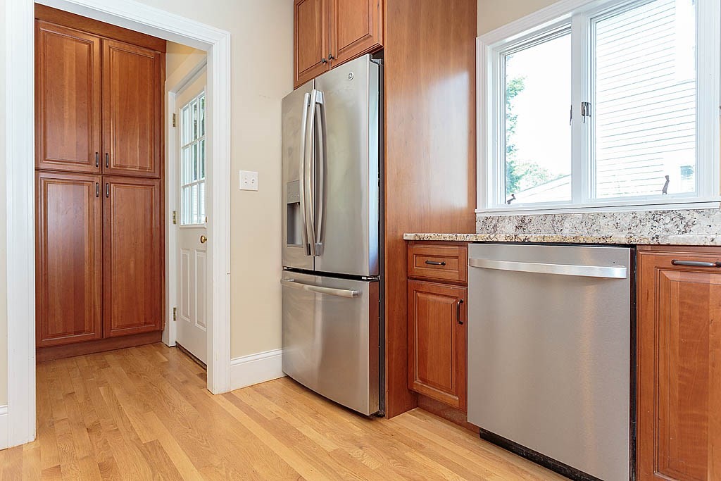 37 Huntington Road Milton, MA 02186 - Photo 22 of 35 a kitchen with stainless steel appliances granite countertop a refrigerator and a sink