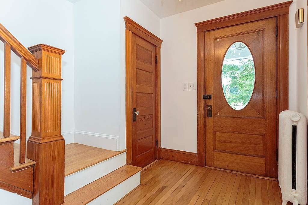 37 Huntington Road Milton, MA 02186 - Photo 23 of 35 wooden floor in a hall with a mirror