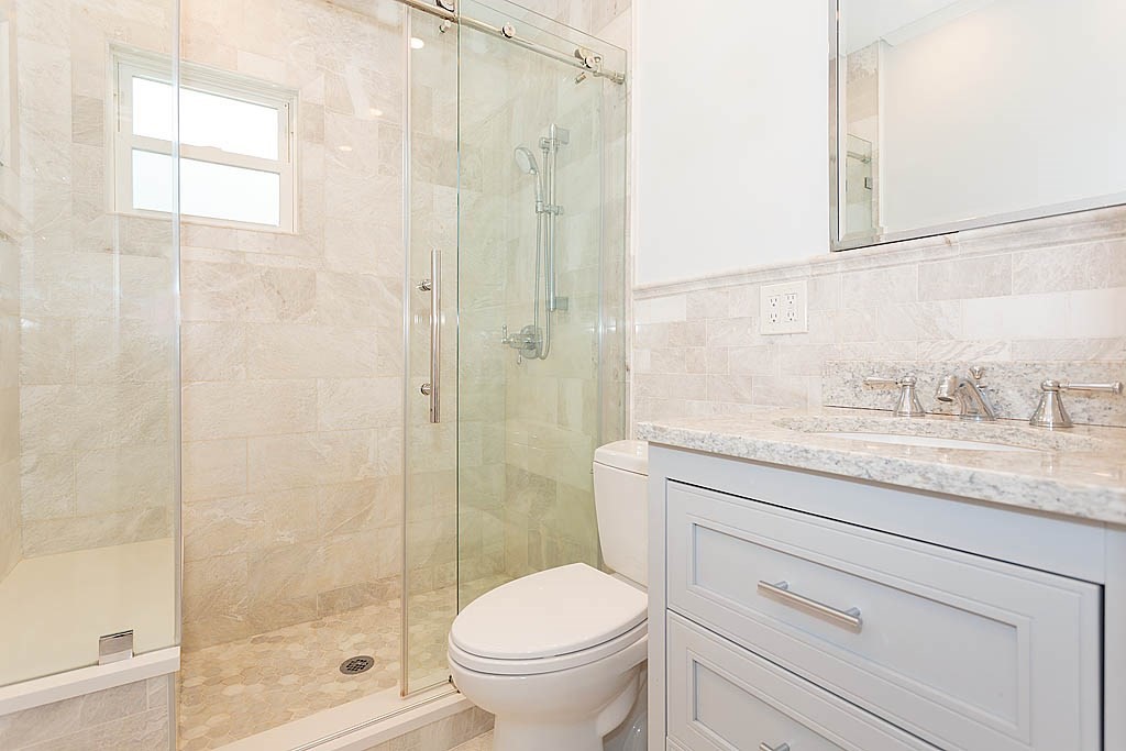 37 Huntington Road Milton, MA 02186 - Photo 32 of 35 a bathroom with a granite countertop sink toilet and shower